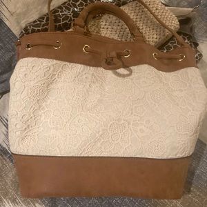 Crochet lace with faux suede bag. New never used